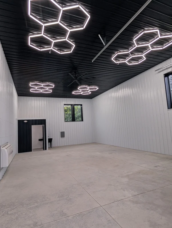 Finished unit interior with LED hex lighting and high ceiling